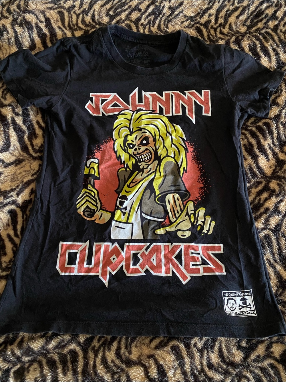 Johnny Cupcakes Women’s Tee with Iron Maiden “Eddie” Graphic